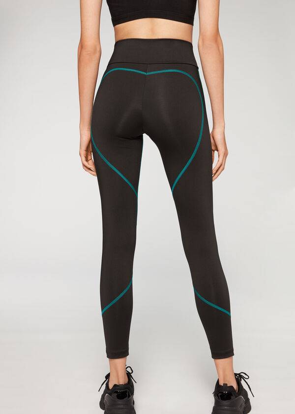 schwarzegrüne calzedonia performance-sportleggings für damen mit kontrastnähten