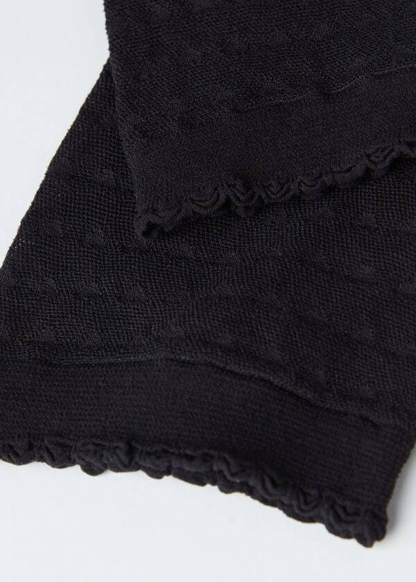schwarze damen-socken von calzedonia mit herzmotiv aus mesh