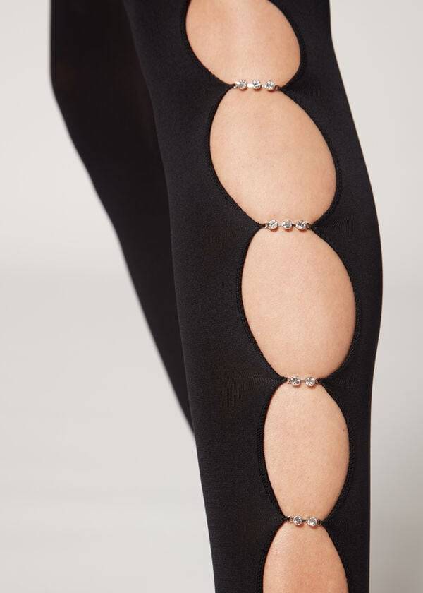 schwarze damen-strumpfhose von calzedonia mit strass-ausschnitt 100 denier blickdicht mit Öko-muster