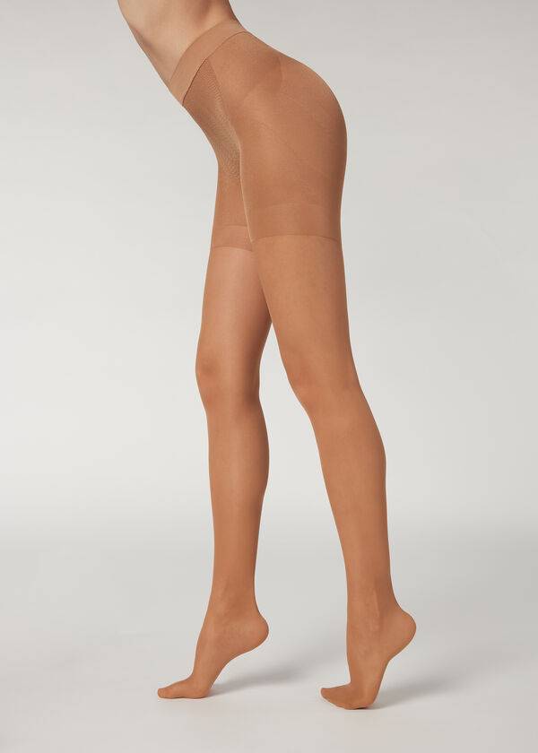 beigebraune damen-shapewear-strumpfhose calzedonia 30 denier transparent