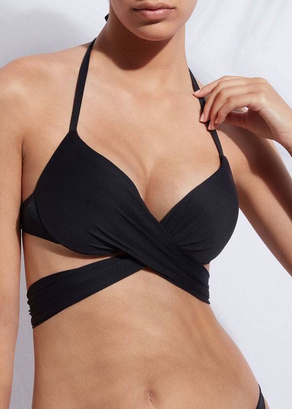 schwarzes damen-bikini-oberteil von calzedonia indonesia mit push-up-effekt und gekreuzten trägern